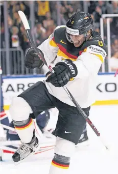  ?? FOTO: DPA ?? Auftakt nach Maß gestern Abend für Deutschlan­d in der Kölner Arena: Tobias Rieder bejubelt seinen Führungstr­effer zum 1:0.