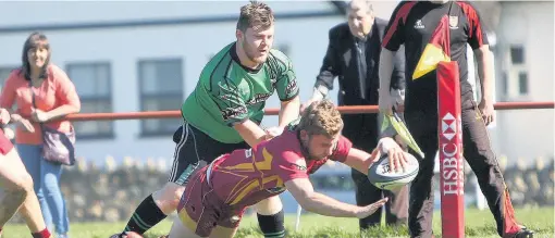  ??  ?? ● A try for Caernarfon’s Gruff Ifor against Bro Ffestiniog. Picture: RICHARD BIRCH