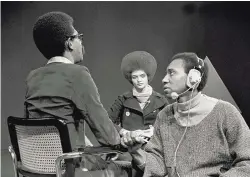  ?? COURTESY OF CHESTER HIGGINS ?? Ellis Haizlip, left, speaks with stage manager Ernest Baxter, right, before an interview with Kathleen Cleaver, center, of the Black Panther Party, during a taping of the series “Soul!”