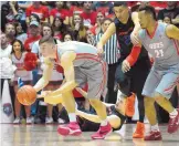  ?? MARLA BROSE/JOURNAL ?? Lobo forward Dane Kuiper, left, will miss at least 10 days after breaking his nose and suffering a concussion Saturday in a loss at Nevada.