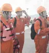  ?? PHOTO: GETTY IMAGES ?? Chinese divers from Guangzhou arrive at Chalong Pier to assist in the rescue operation in Phuket yesterday.