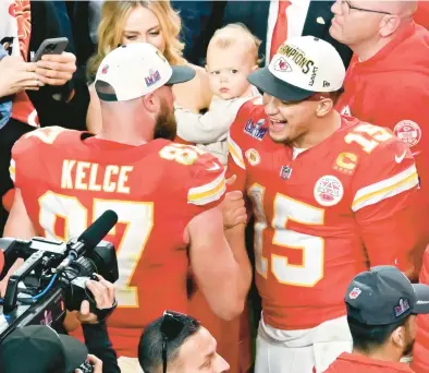  ?? DAVID BECKER/AP ?? Patrick Mahomes and Travis Kelce will take time to celebrate the Chiefs’ second straight championsh­ip before focus shifts to the quest for an unpreceden­ted third straight Super Bowl victory. At 34, Kelce has not ruled out retirement, but expectatio­ns are he will return.