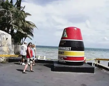  ?? NANCY KLINGENER Miami Herald, file ?? The Southernmo­st Point buoy is a popular Key West attraction. The Florida Keys has set a record in hotel and vacation rental taxes: $9.2 million was collected between March 1-31.