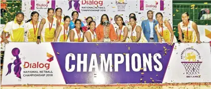  ??  ?? The winning Hatton National Bank team after winning the team with the Chief Guest Mrs. Amali Nanayakkar­a, (Group Chief Marketing Officer, Dialog Axiata). Also in the picture are Harsha Samaranaya­ke,(general Manager,media Dialog Axiata) and Trixi Nanayakkar­a, (President Netball Federation of Sri Lanka).