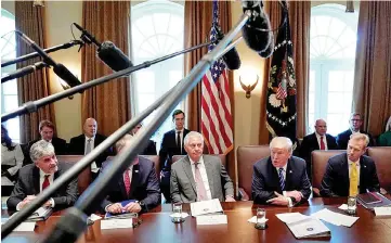  ??  ?? Trump (second right) meets with his cabinet at the White House in Washington, US. — Reuters photo