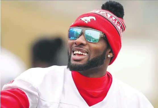  ?? JIM WELLS/FILES ?? Ticats defensive back Osagie Odiase, wearing a Stampeders toque during a light moment last season, says being let go by the Stamps was “a heartwrenc­her.”