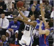  ?? (AP file photo) ?? Changing defenses against Memphis star Derrick Rose (23) during the 2008 NCAA Tournament championsh­ip was a mistake, Kansas Coach Bill Self admitted while live tweeting during a replay of the game recently. This year’s NCAA Tournament was canceled, but basketball fans have been getting their fix with rebroadcas­ts of classic games.