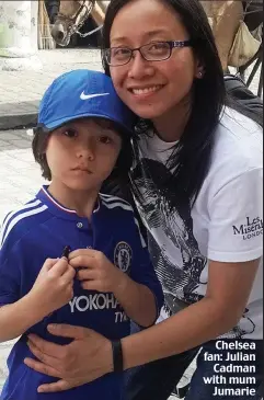  ??  ?? Chelsea fan: Julian Cadman with mum Jumarie