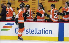  ?? CHRIS SZAGOLA — THE ASSOCIATED PRESS ?? The Flyers’ James van Riemsdyk celebrates his goal with teammates during the first period against the Penguins on Wednesday.