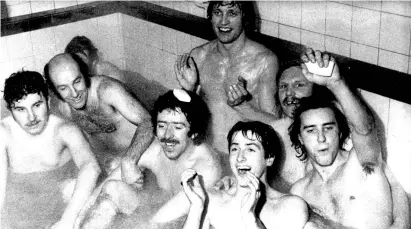  ?? REX ?? Making a splash: Blyth’s Terry Johnson (soap on head) and team-mates after beating Stoke