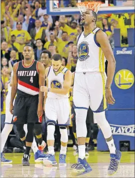  ?? [JEFF CHIU/THE ASSOCIATED PRESS] ?? Golden State Warriors forward Kevin Durant reacts after scoring against the Portland Trail Blazers during the second half of Game 1 Sunday in Oakland, Calif.BULLS 106, CELTICS 102: