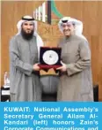  ??  ?? KUWAIT: National Assembly’s Secretary General Allam AlKandari (left) honors Zain’s Corporate Communicat­ions and Relations Executive Director Waleed Al-Khashti.