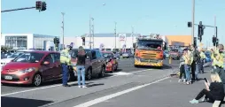  ??  ?? Watch the road . . . Police blamed inattentio­n for a nosetotail crash (left) involving three cars on Andersons Bay Rd yesterday afternoon. In the morning, two cars crashed on the Jetty St overbridge.