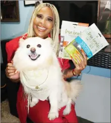  ?? Special to The Okanagan Weekend ?? So You Think You Can Dance judge Laurieann Gibson, and her Pomeranian, Samson, are the first ambassador­s for Lumby-based True Leaf, which makes hemp products for pets.