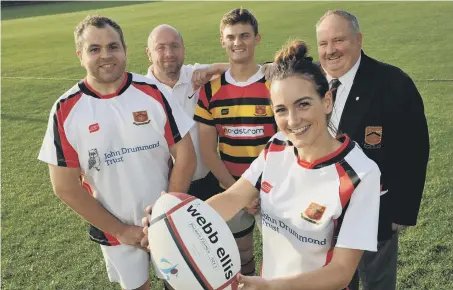  ??  ?? Amy Drummond with Sunderland Rugby Club’s Ryan Buckley, Bradley Fish, Paul Geehan, and sponsor David Nordstrom.