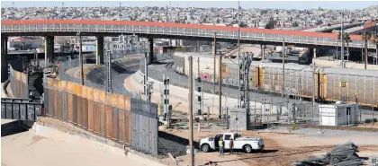  ?? Photo / AP ?? A 5.5m-high metal barrier is replacing the border fence that ran through El Paso.