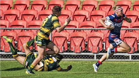  ?? Photo: Nev Madsen ?? FAST MOVER: Cowboys winger Mitchell Watson breaks past Wattles Michael Marshall and Nicholas Van Der Poel in his side’s 26-12 victory at Clive Berghofer Stadium yesterday.