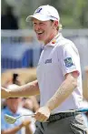  ?? THE ASSOCIATED PRESS ?? Brandt Snedeker grins after sinking a birdie putt on the ninth hole at the Wyndham Championsh­ip on Thursday.