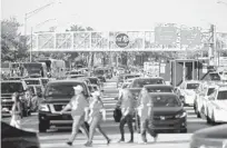  ?? JOHN MCCALL/SUN SENTINEL ?? Traffic outside of Hard Rock Stadium in Miami Gardens.