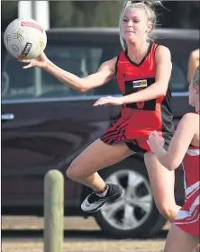  ??  ?? UP FOR CHALLENGE: Ararat overcame a spirited Stawell outfit 46-30 during a Good Friday clash. Pictured in action clockwise from left, Ararat’s Kate Bligh takes control; Stawell’s Rachel Wood tries her best to stop Ararat goal attack Tayla Borrelli from scoring; and Stawell centre Tarnee Orr keeps the ball in play. Pictures: PAUL CARRACHER