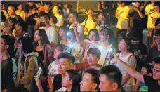  ?? YOU SIHANG / FOR CHINA DAILY ?? Audience members at a music concert in Tianjin.