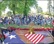  ?? NICK SMIRNOFF / FOR THE CALIFORNIA­N ?? A 2021 Memorial Day Ceremony in Philip Marx Central Park in Tehachapi was well-attended.