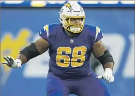  ?? Kyusung Gong Associated Press ?? JAMAREE SALYER fared well in replacing an injured Rashawn Slater at left tackle as a rookie and has the skills to play other positions on the offensive line.