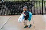  ?? ANTONIO PEREZ/CHICAGO TRIBUNE ?? Messiah Herron heads to prekinderg­arten for his first day of school Sept. 3, 2019.