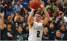  ?? OWEN MCCUE — MEDIANEWS GROUP ?? Methacton’s Owen Kropp (2) shoots a three in front of the Warriors’ student section in a PIAA 6A win over Lincoln on Wednesday at William Tennent.