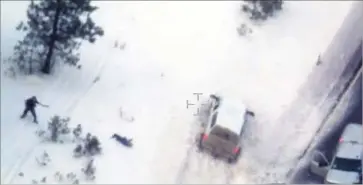  ?? FBI ?? AN FBI VIDEO shows Robert “LaVoy” Finicum after he was shot on Jan. 26, 2016, near Burns, Ore. The fatal shot was justified, prosecutor­s say, but an FBI agent was indicted on suspicion of lying about other shots fired.