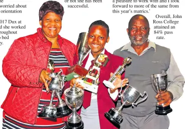  ?? John Ross College ?? A beaming Nozi Mngomezulu (John Ross College Dux) and her parents, Margaret and Richard Mngomezulu, with all the trophies she was awarded at the end of last year