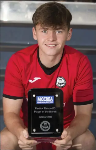  ??  ?? Young full-back James Penrice picks up the Partick Thistle Player of the Month award for October