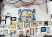  ??  ?? Newspaper articles are displayed on one wall of the restaurant . The nautical theme is ever present here — a nod to Ventura’s heritage in seaside Portugal.