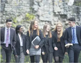  ??  ?? Cathedral School sixth form pupils enjoying school life