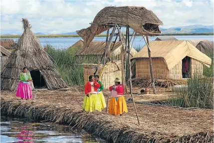  ?? iSTOCK ?? The Uros people live on the floating reed islands of Lake Titicaca, the largest lake in South America and the highest navigable lake in the world