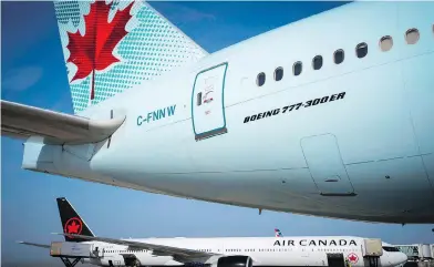  ?? JOEL SAGET / AFP / GETTY IMAGES ?? Both Air Canada and Aeroplan sought to reassure customers Wednesday of a smooth transition to Air Canada’s new loyalty program launching in 2020 in light of a $450-million deal to sell Aeroplan to a consortium led by the airline.