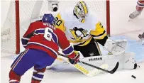  ?? FRANK GUNN THE CANADIAN PRESS FILE PHOTO ?? Goalie Matt Murray makes a save for Pittsburgh on Montreal Canadiens’ Shea Weber (6) during Eastern Conference Stanley Cup playoff action. Murray is headed to the Ottawa Senators.