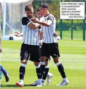  ?? DAN WESTWELL ?? Kairo Mitchell, right, is congratula­ted after scoring against Leicester City on Saturday