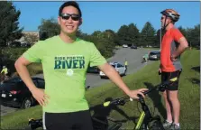  ?? MICHILEA PATTERSON – FOR MEDIANEWS GROUP ?? Nate Bach, of Reading, poses for a photo next to his bike while wearing a “Ride for the River” T-shirt. Bach participat­ed in the annual group cycle for the first time last year when he did the 16-mile option.