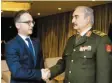  ?? Foto: Xander Heinl, photothek.net, dpa ?? Außenminis­ter Maas trifft General Haftar.