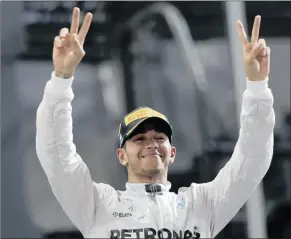  ?? PICTURE: REUTERS ?? Six years after winning his first title with McLaren, Lewis Hamilton celebrates becoming world champion for the second time, this time with Mercedes.