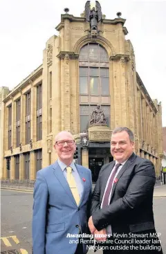  ??  ?? Awarding times Kevin Stewart MSP and Renfrewshi­re Council leader Iain Nicolson outside the building