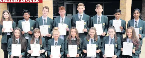  ??  ?? Success The students who attained 7 As at National 5 (back row left to right) Emily Harkness, Alen Reji, Joe Mckie, Liam Ryan, Jakub Sokolowski, Pawel David, Alan Joy, Elina Joy (front) Jenna Craig, Rebecca Mcguigan, Olivia Mckale, Missy Mclaren,...