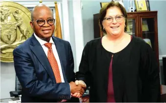  ??  ?? Governor, State of Osun, Mr. Adegboyega Oyetola in a handshake with Consul-General, Claire Pierangelo during a courtesy visit by the Consul General and her team to the Governor in his office at Abere, Osogbo on Monday