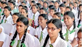  ??  ?? Schoolchil­dren at the event. Pix by Amila Gamage