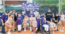  ?? COURTESY ?? South Florida Hooters Girls served as volunteer “buddies” with the Sunrise Rockies players in Little League Baseball’s Challenger Division. Hooters also provided new uniforms and caps.