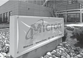  ?? STEVE HELBER/AP FILE ?? Micron manufactur­es the diminutive chips that power everything from smartphone­s to computers to automobile­s.