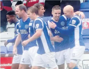  ?? Peter Hilton Photograph­y ?? Macc celebrate Mitch Hancox’s winner