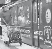  ?? PHOTOS: MARK LENNIHAN/THE ASSOCIATED PRESS ?? A New York City subway car bears advertisin­g for NBC’s coverage of the English Premier soccer league. The network spent $250 million to win U.S. broadcast rights.