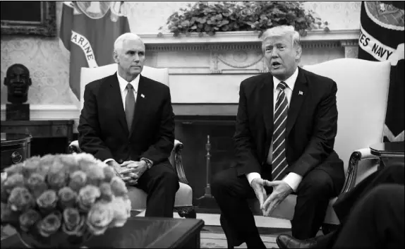  ?? AL DRAGO / THE NEW YORK TIMES) ?? President Donald Trump, shown Sept. 6 in the Oval Office of the White House with Vice President Mike Pence, has acceded to a request from House Minority Leader Nancy Pelosi, D-Calif., to reassure 800,000 participan­ts in the Deferred Action for...